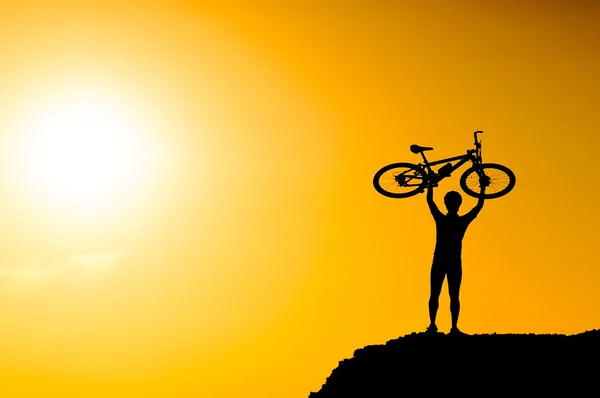 Silhouette of a mountain bike cyclist — Stock Photo, Image