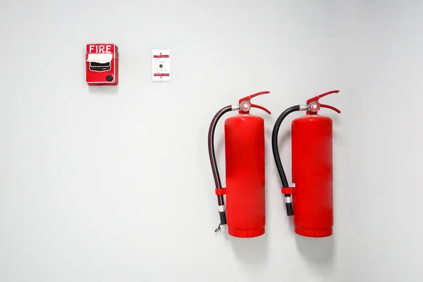 Fire extinguisher hung on the wall — Stock Photo, Image