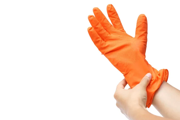 Hand trägt schützenden Kunststoffhandschuh — Stockfoto