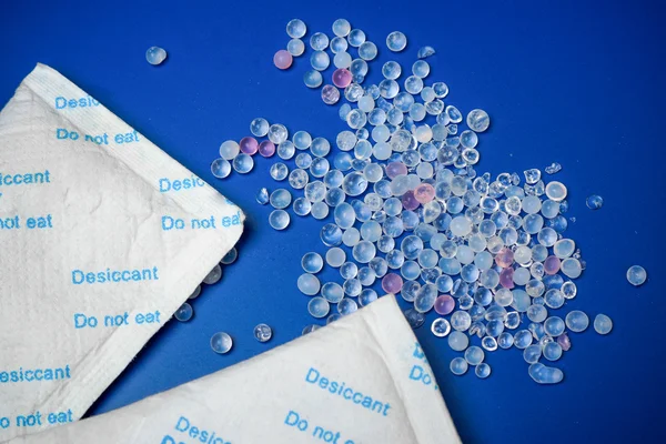 Silica gel on blue — Stock Photo, Image