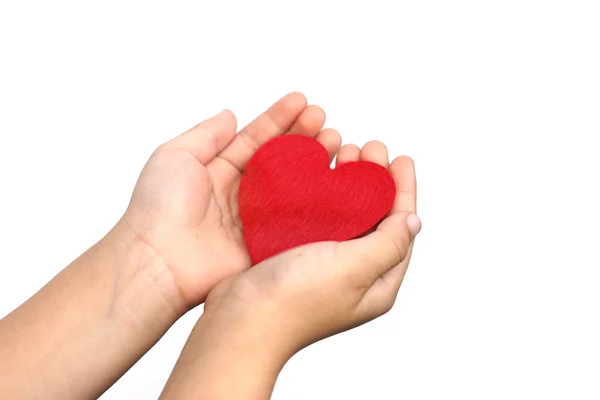 Hands holding a red heart — Stock Photo, Image