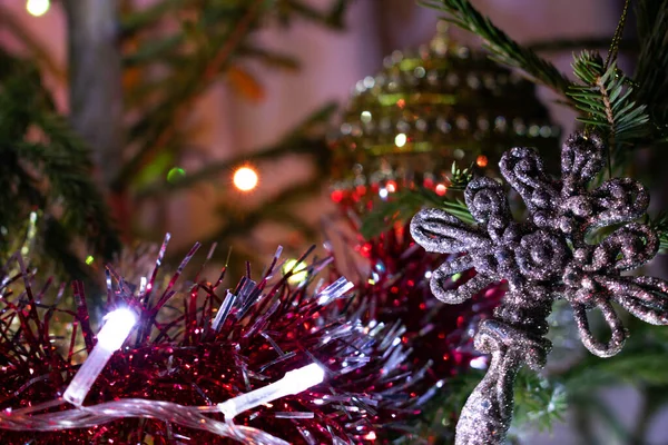 Christmas tree in bright garland lights