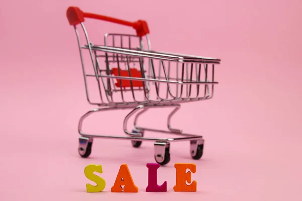 Shopping Trolley Inscription Sale Pink Background — Stock Photo, Image