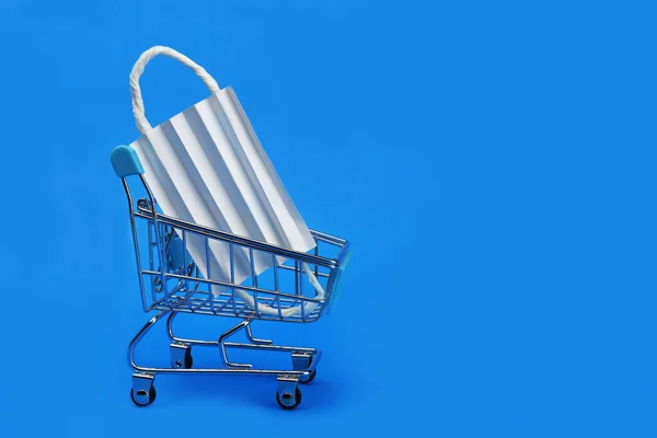 Shopping Cart Medical Protective Bandage Blue Background — Stok Foto