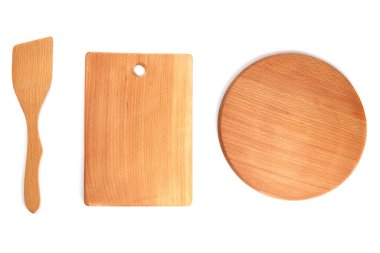 Wooden cutting boards and spoon isolated on white