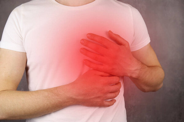 Man having heart attack, red pain area