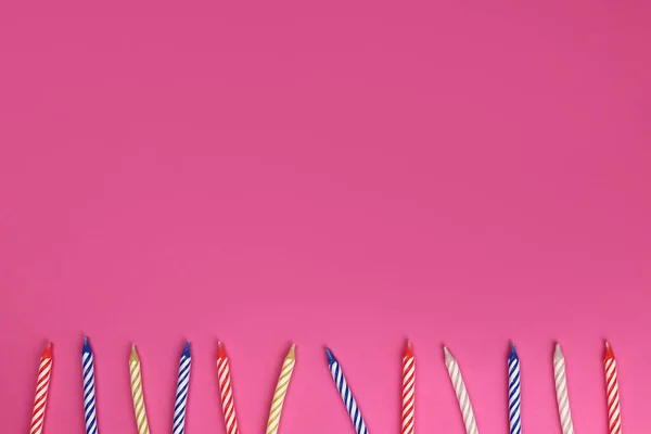 Row Colorful Birthday Candles Pink Background Celebration Party — Foto de Stock