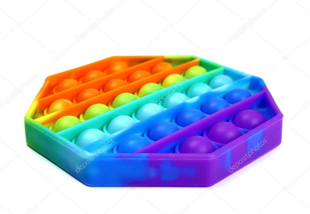 Pop it rainbow. Trendy antistress toy isolated on white