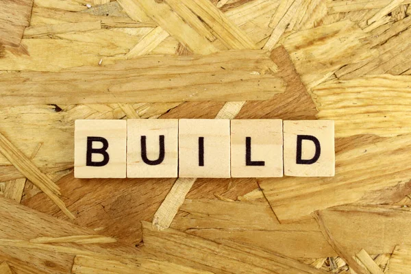 Word Build Made Wooden Blocks Osb Background — Stock Photo, Image