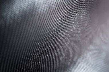 Soyut karanlık backgroud sığ derinliği alan karbon fiber metin