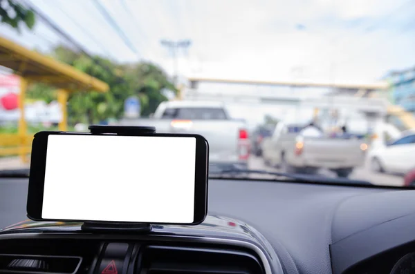 Telefone inteligente móvel em branco no fundo da estrada profundidade rasa de fie — Fotografia de Stock