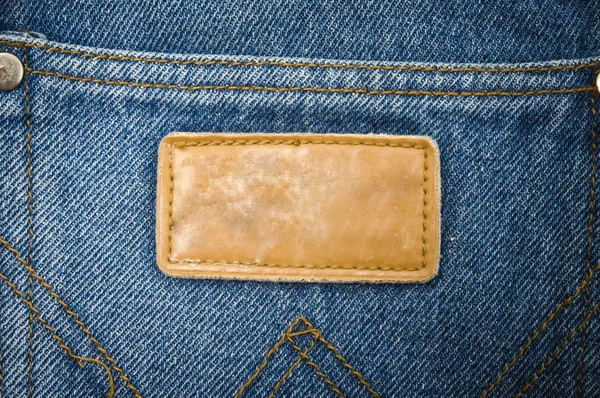 Nära håll tag på jeans bakgrundsstruktur — Stockfoto