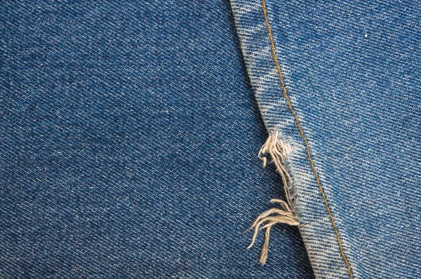 Nära håll jeans bakgrundsstruktur — Stockfoto