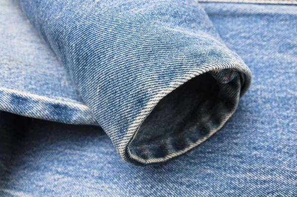 Nära håll jeans bakgrundsstruktur — Stockfoto