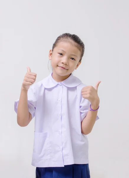 Ásia crianças bonito menina no estudante 's uniforme no branco fundo — Fotografia de Stock