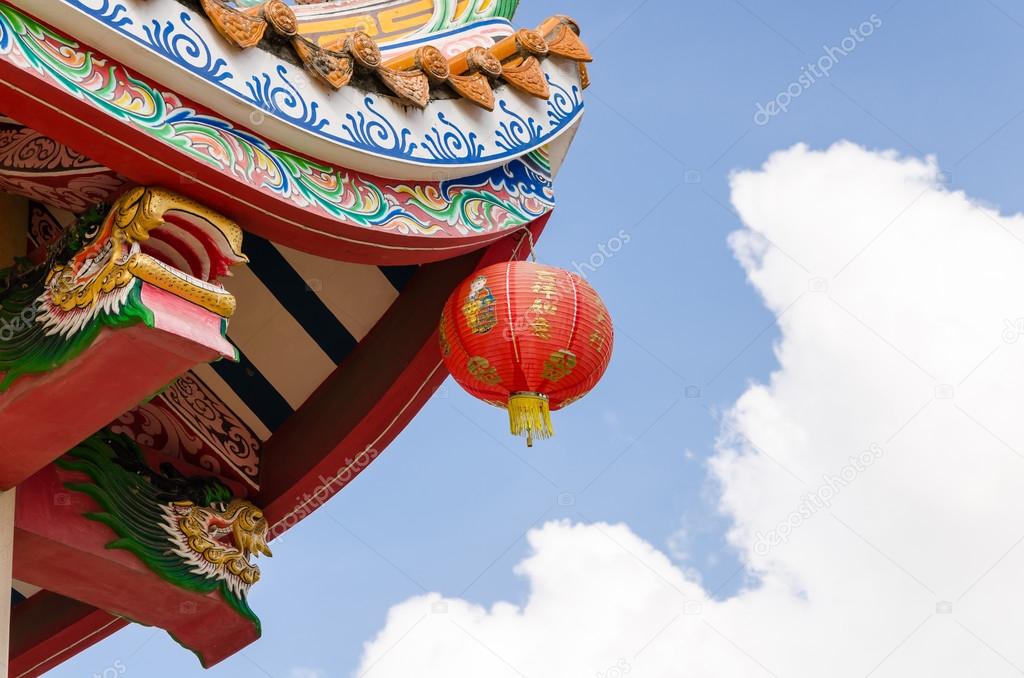 Close up red lantern and roof of chinese old temple 
