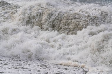 Deniz köpüğü ve su şeklinde desenli bir arka plan.