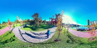Batumi, Georgia - 7 Mart 2021: 360 VR Man in the park, pictures