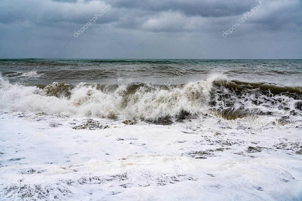 sea waves hit the shore, storm