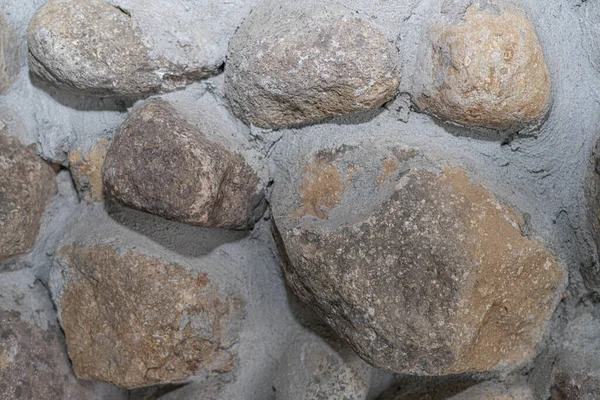 水泥中的石头作为抽象的背景 — 图库照片