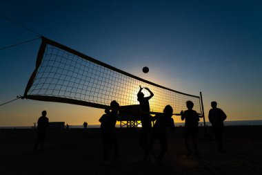 Batumi, Georgia - May 20, 2021: Playing Volleyball at Sunset