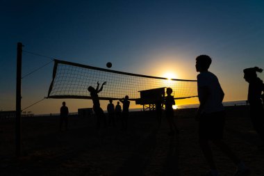 Batumi, Georgia - May 20, 2021: Playing Volleyball at Sunset