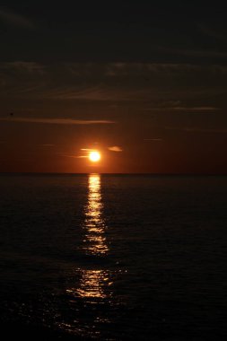 Light path at sunset from the sun over the sea