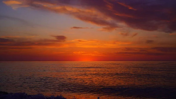 青いオレンジの海の夕日 — ストック写真