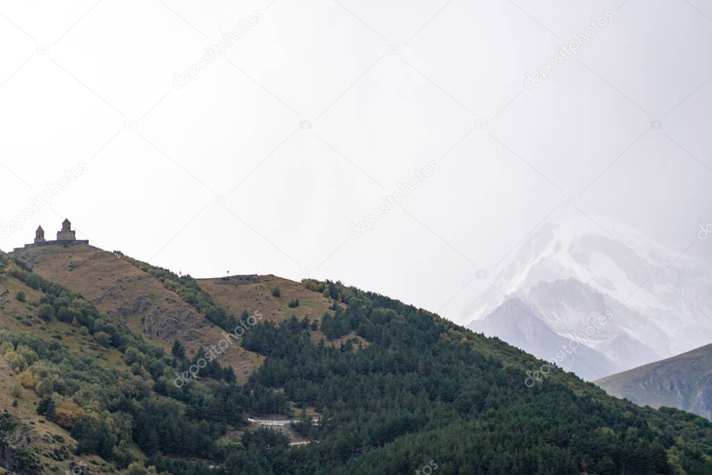 Gray mountain against the blue sky