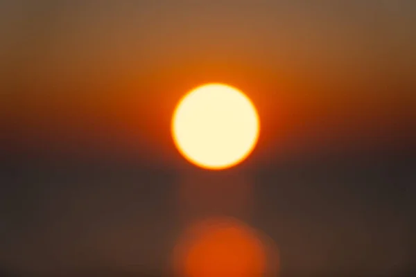 sunset on the Black Sea in June, the sun is out of focus