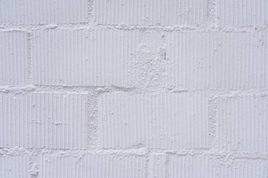 Soyut bir arkaplan olarak duvardaki beyaz alçı