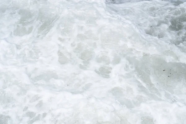 background in the form of sea foam, waves on the sea