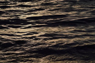 Gün batımında deniz şeklinde bir arkaplan