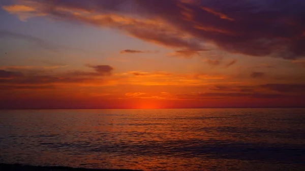 青いオレンジの海の夕日 — ストック写真