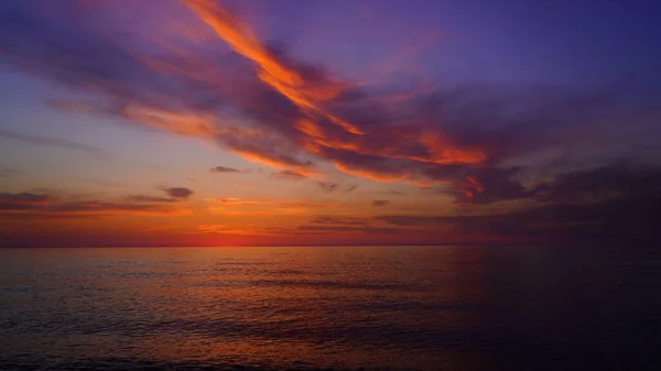 青いオレンジの海の夕日 — ストック写真