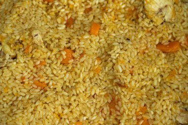 Türkmen pilavı, ateşte pilav pişirmek.