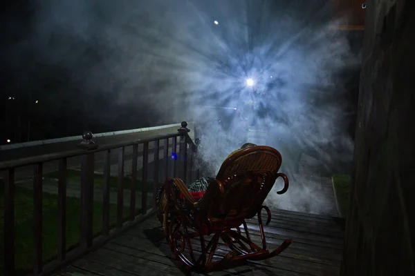 Simulation of night fog on a movie set.