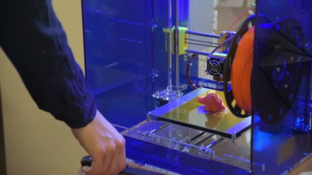 Architect working in office creating models for project using 3D printer. — Stock Video