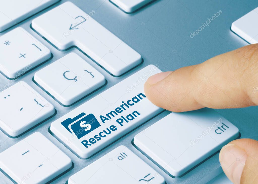 American Rescue Plan Written on Blue Key of Metallic Keyboard. Finger pressing key.