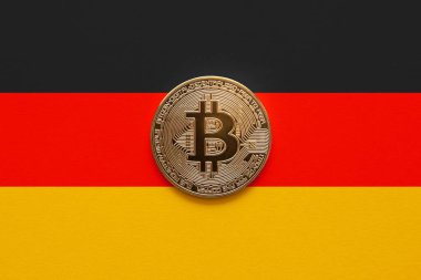 One bitcoin on a German flag background. German law allowing institutional funds to invest in cryptocurrencies on August 2021 clipart