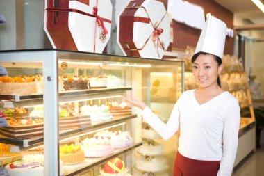 Mutlu fırın satış elemanı fırının yüksek kaliteli fotoğrafında.