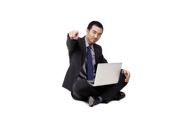 A happy young Business man using laptop — Stock Photo, Image