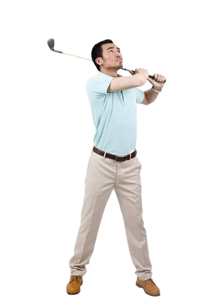 Young man wearing a suit and golfing — Stock Photo, Image