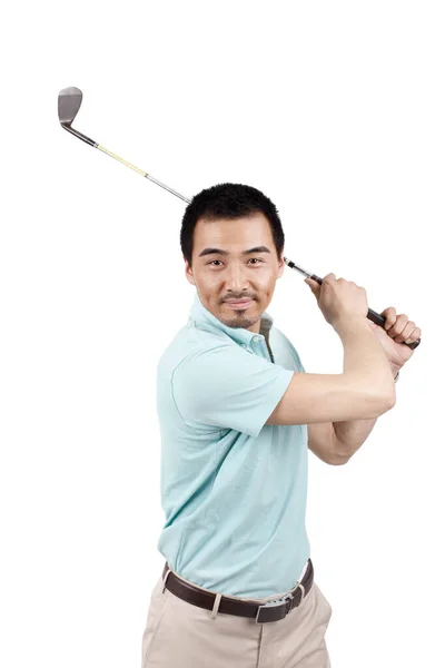 Young man wearing a suit and golfing — Stock Photo, Image