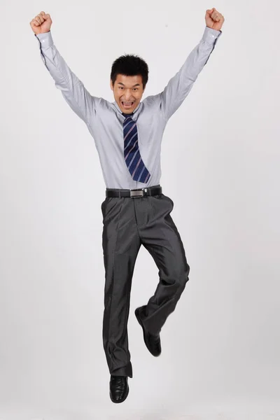 A business man jumping up in a shirt — Stock Photo, Image