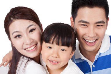 Tek çocuklu mutlu bir ailenin portresi. 