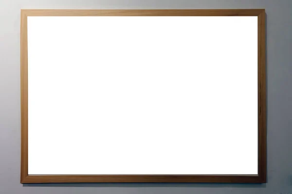 A blank picture frame in the exhibition room — Stock Photo, Image