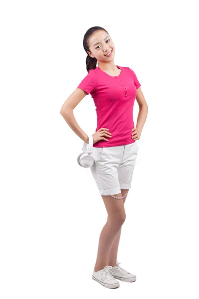 Portrait of a Young woman holding headphones — Stock Photo, Image