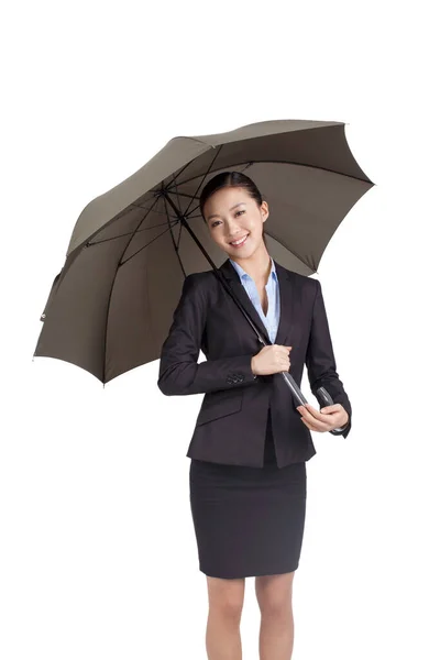 Retrato de uma empresária segurando sob guarda-chuva — Fotografia de Stock