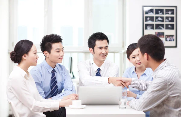 Young Business men shaking hands at office — Stock Photo, Image